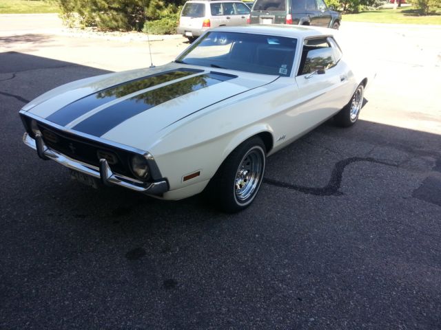 1971 Light tan or brown with racing strips on hood&trun Ford Mustang