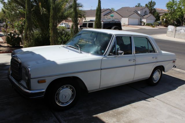 1971 White Mercedes-Benz 200-Series Sedan
