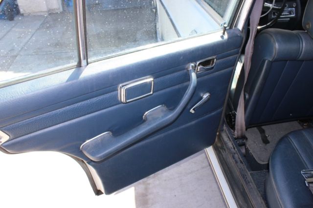 1971 White Mercedes-Benz 200-Series Sedan