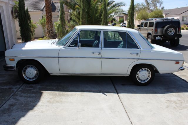 1971 White Mercedes-Benz 200-Series Sedan