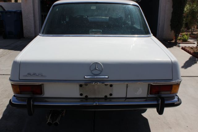 1971 White Mercedes-Benz 200-Series Sedan