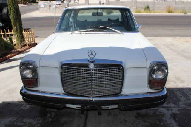 1971 White Mercedes-Benz 200-Series Sedan