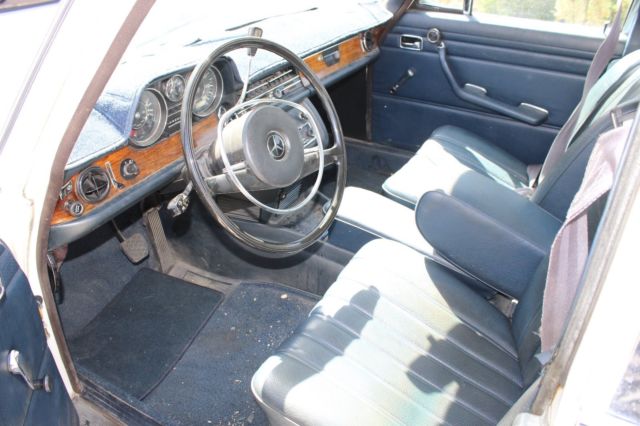 1971 White Mercedes-Benz 200-Series Sedan