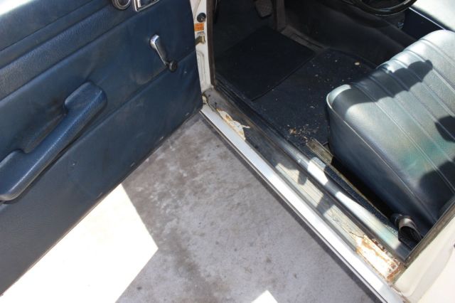 1971 White Mercedes-Benz 200-Series Sedan