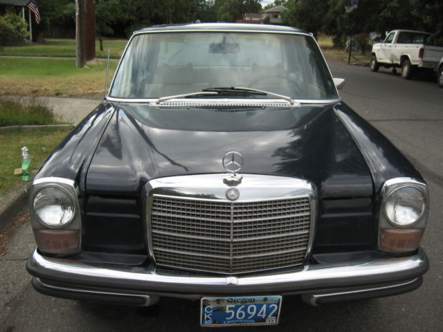 1971 White Mercedes-Benz 200-Series Sedan