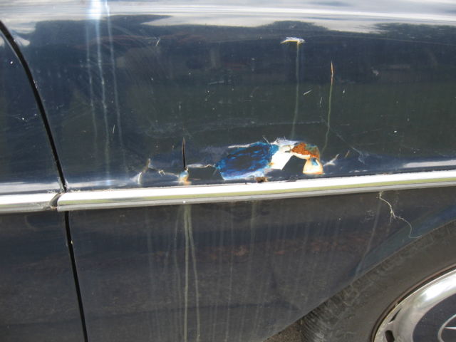 1971 White Mercedes-Benz 200-Series Sedan