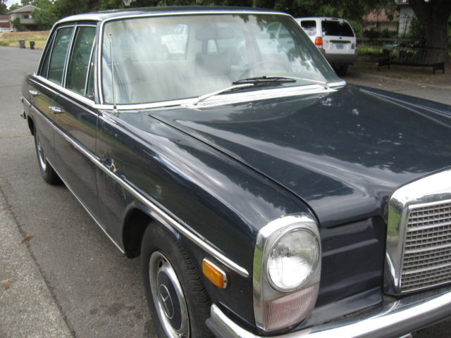 1971 White Mercedes-Benz 200-Series Sedan