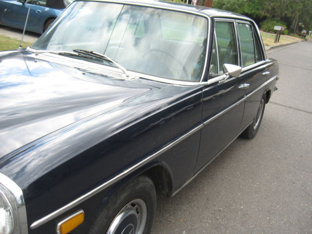 1971 White Mercedes-Benz 200-Series Sedan