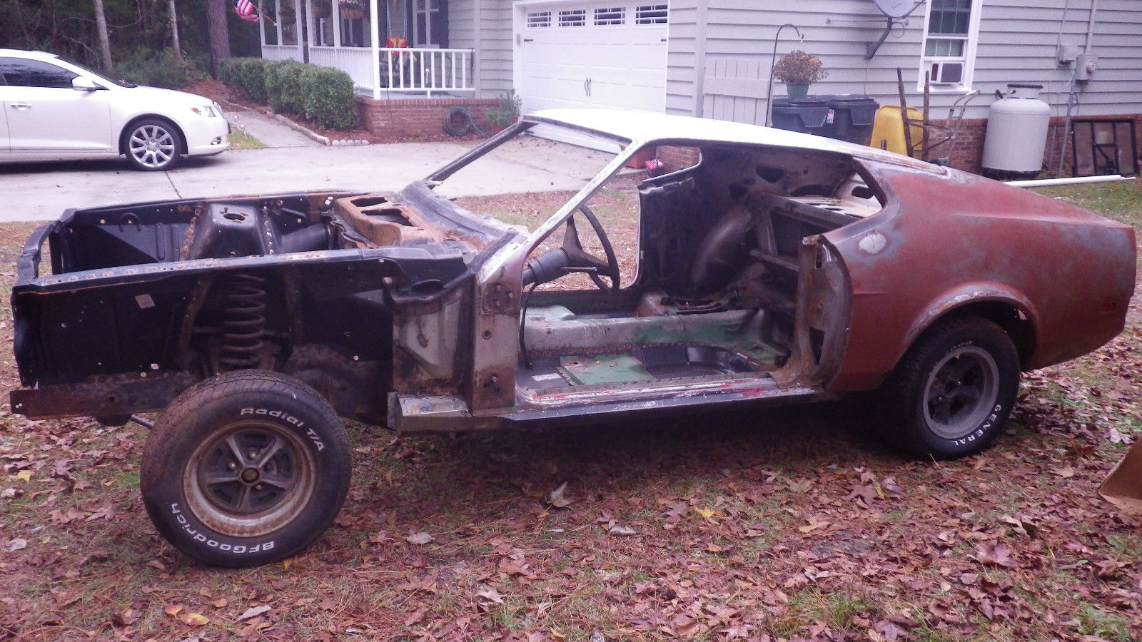1971 Orange with black stripes Ford Mustang Fastback