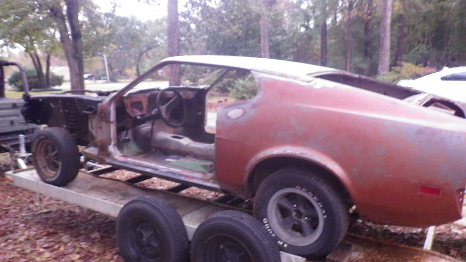 1971 Orange with black stripes Ford Mustang Fastback