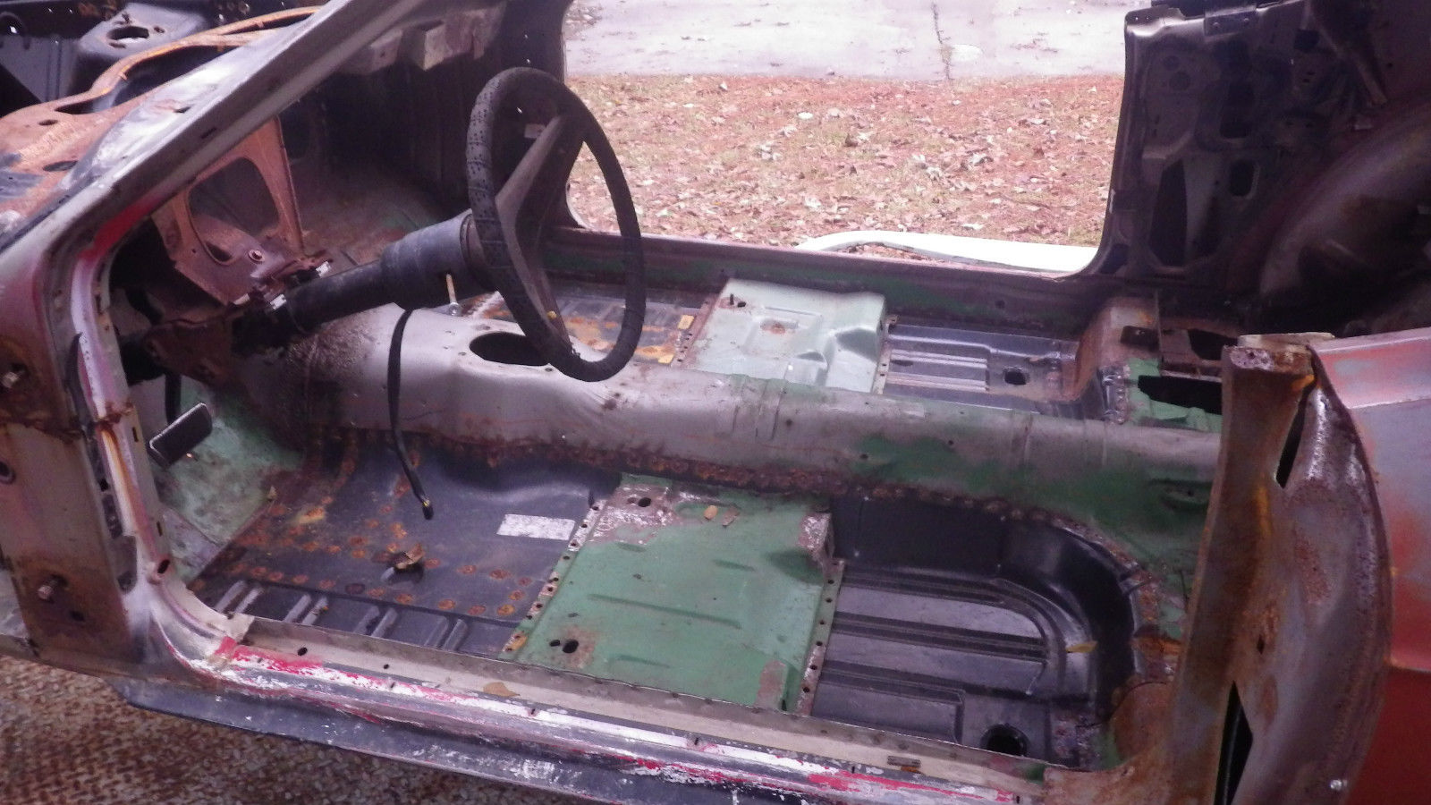 1971 Orange with black stripes Ford Mustang Fastback