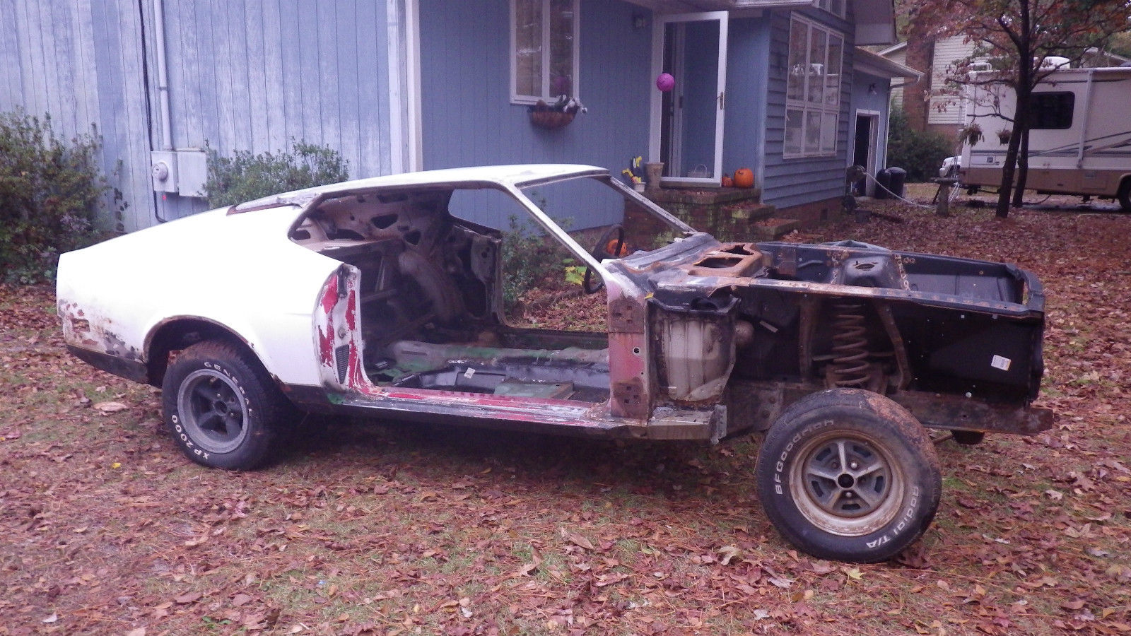 1971 Orange with black stripes Ford Mustang Fastback