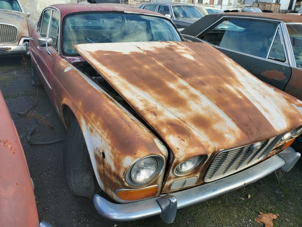 1971 Burgundy Jaguar XJ6 Sedan
