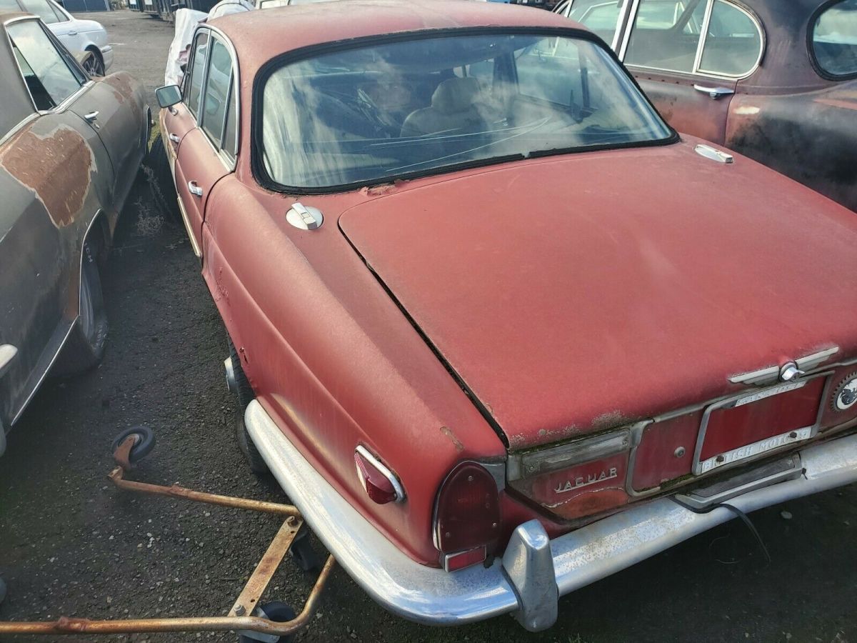1971 Burgundy Jaguar XJ6 Sedan