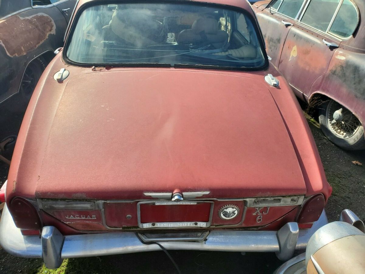 1971 Burgundy Jaguar XJ6 Sedan