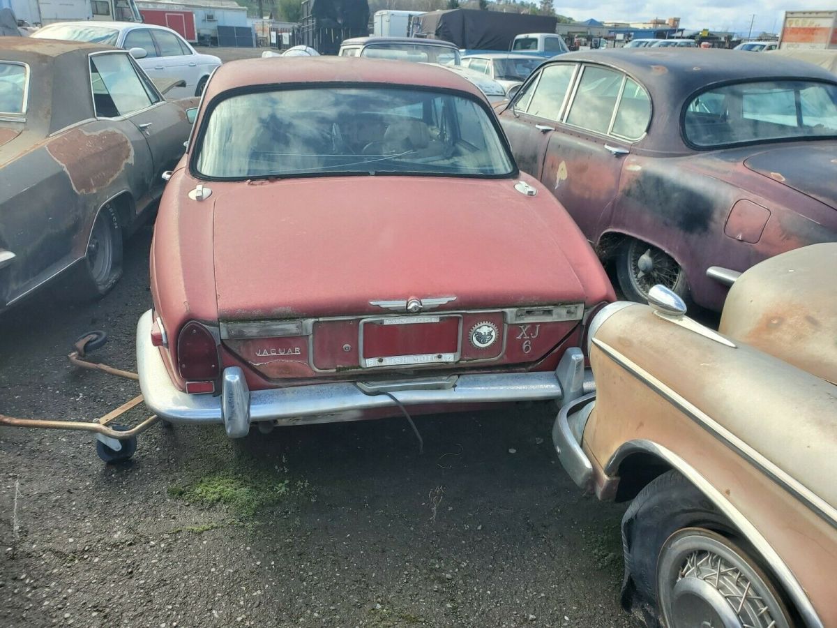 1971 Burgundy Jaguar XJ6 Sedan