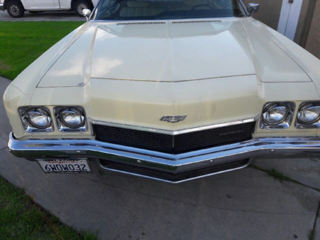 1972 butternut yellow Chevrolet Impala Convertible