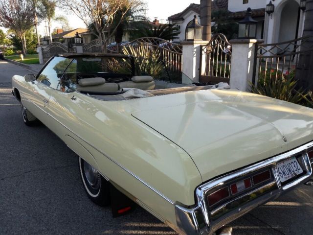 1972 butternut yellow Chevrolet Impala Convertible