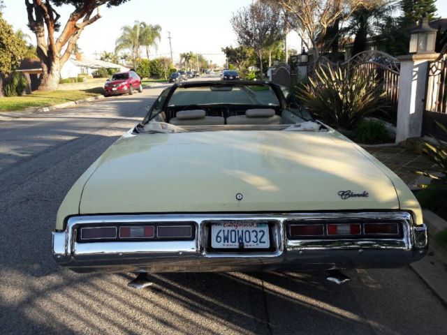 1972 butternut yellow Chevrolet Impala Convertible