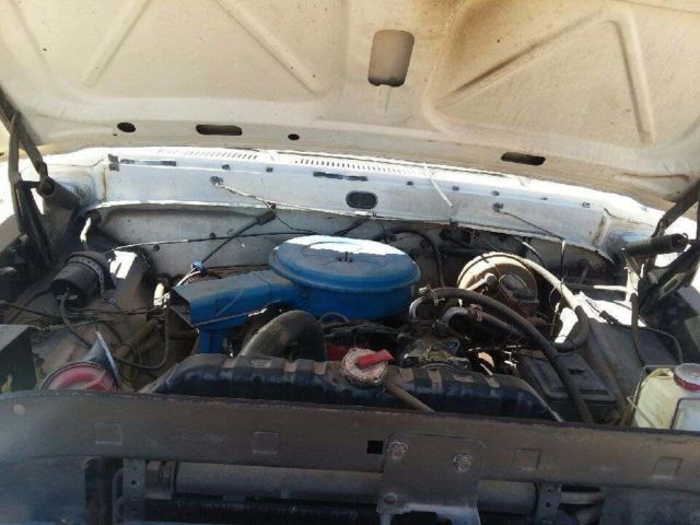 1972 Orange and White Ford F-100 Standard Cab Pickup