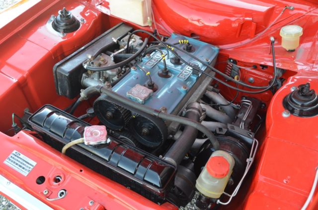 1972 Sunset Red Ford Escort Saloon