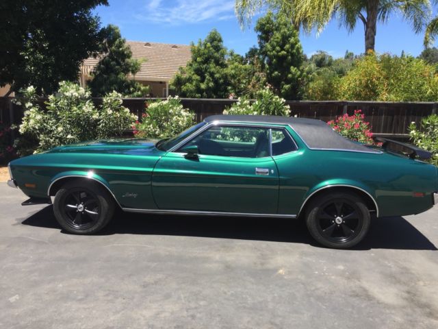 1972 Dark metallic green Ford Mustang Coupe