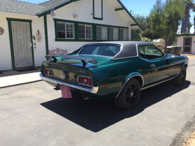 1972 Dark metallic green Ford Mustang Coupe