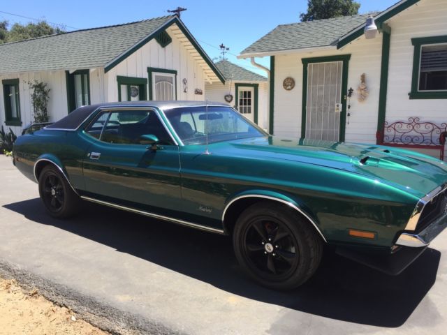 1972 Dark metallic green Ford Mustang Coupe