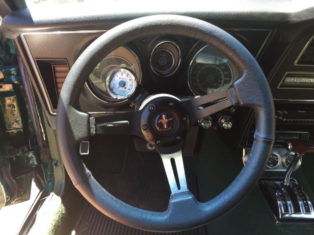 1972 Dark metallic green Ford Mustang Coupe