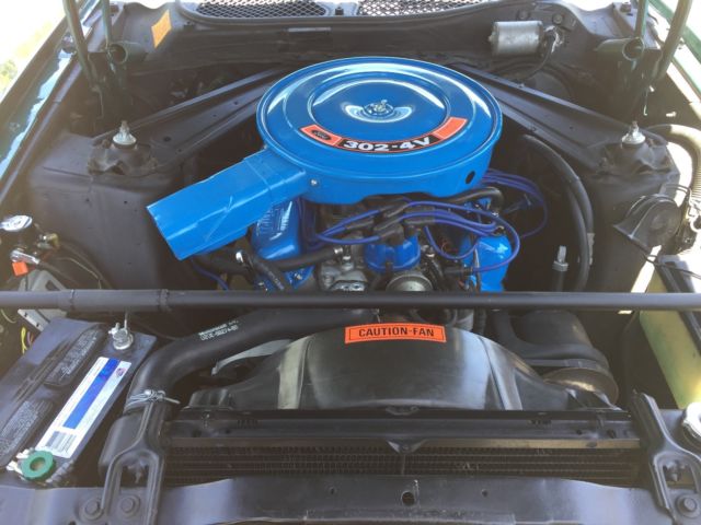 1972 Dark metallic green Ford Mustang Coupe