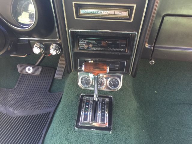 1972 Dark metallic green Ford Mustang Coupe