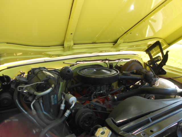 1972 grapefruit yellow and white GMC Sierra 2500 Standard Cab Pickup