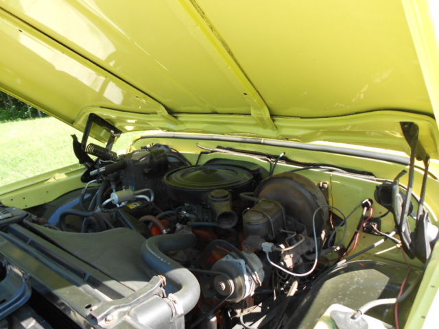 1972 grapefruit yellow and white GMC Sierra 2500 Standard Cab Pickup