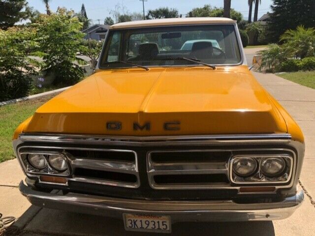 1972 yellow and white GMC C15 Standard Cab Pickup