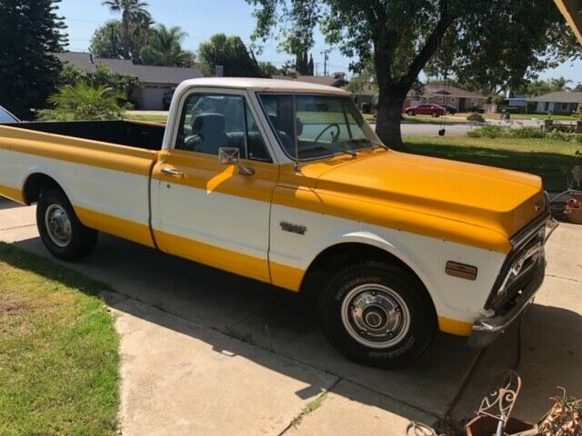 1972 yellow and white GMC C15 Standard Cab Pickup