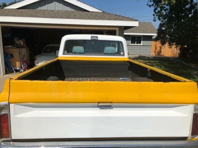 1972 yellow and white GMC C15 Standard Cab Pickup