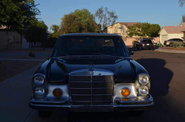1972 Black Mercedes-Benz 200-Series Sedan