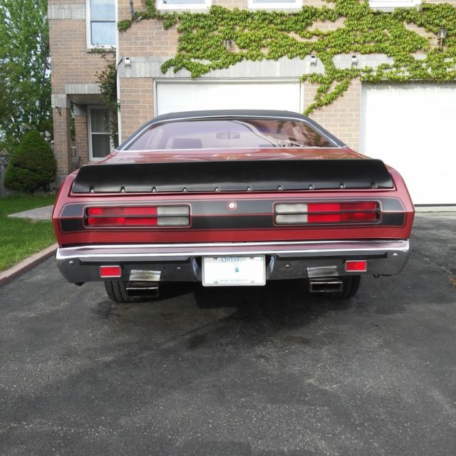 1972 Burgundy Plymouth Duster Coupe