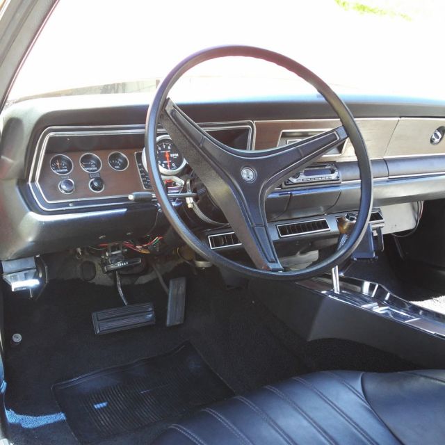 1972 Burgundy Plymouth Duster Coupe