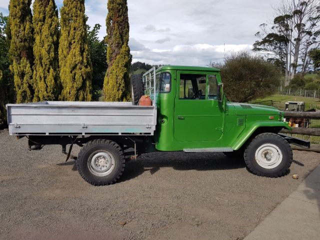 1972 green (has been painted) Toyota Land Cruiser pick up ute