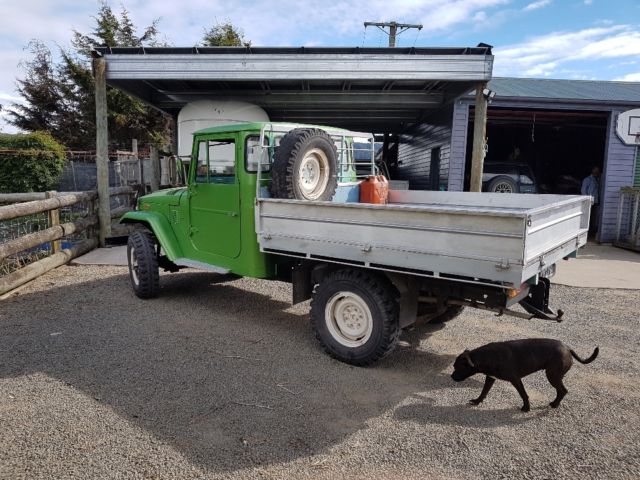 1972 green (has been painted) Toyota Land Cruiser pick up ute