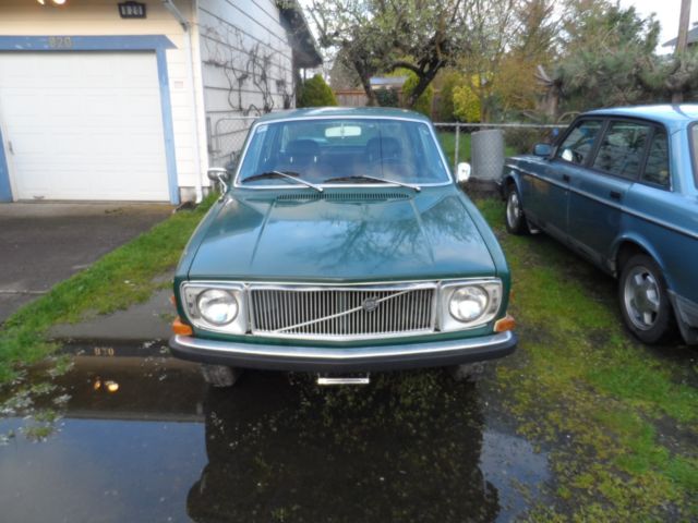  White Volvo 144 Sedan