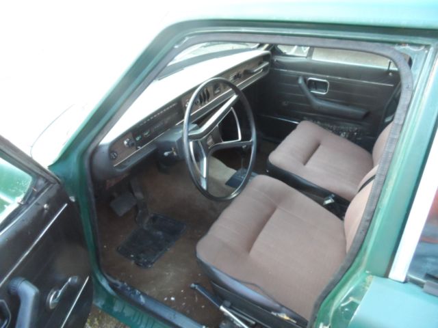  White Volvo 144 Sedan