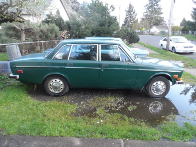  White Volvo 144 Sedan
