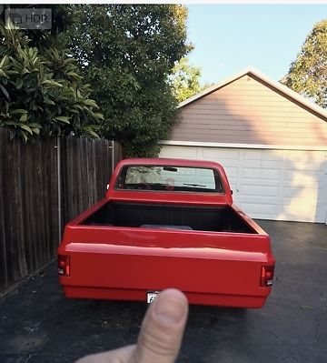 1973 --red Chevrolet C-10 --short bed