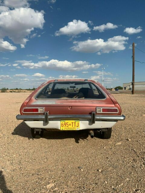 1973 Burgundy Ford Pinto Hatchback