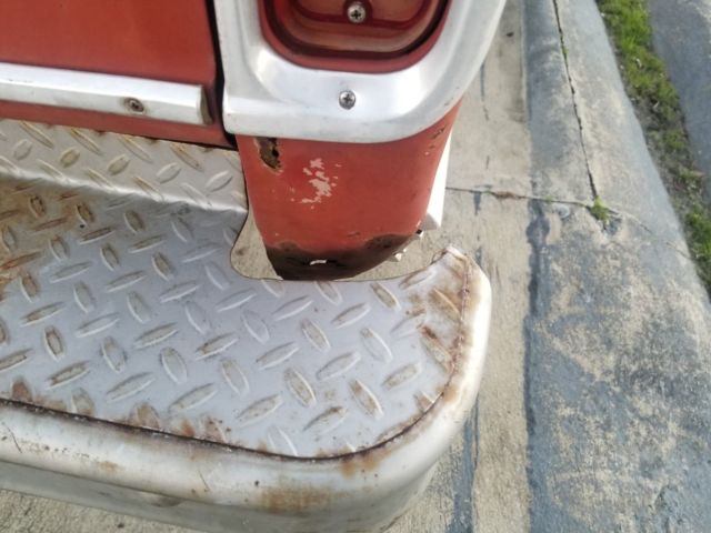 1973 red Ford F-100 Standard Cab Pickup