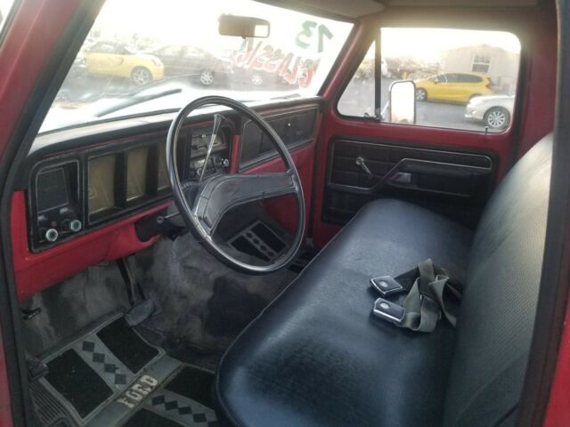 1973 red Ford F-100 Standard Cab Pickup