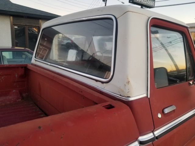 1973 red Ford F-100 Standard Cab Pickup