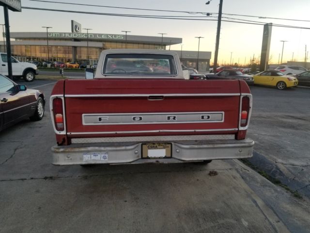 1973 red Ford F-100 Standard Cab Pickup
